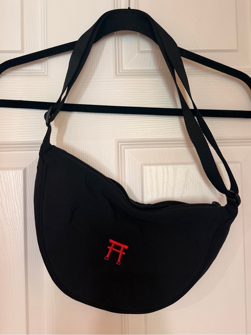 Uniqlo Round Black Crescent Shoulder Bag with Red Embroidered Logo from Japan